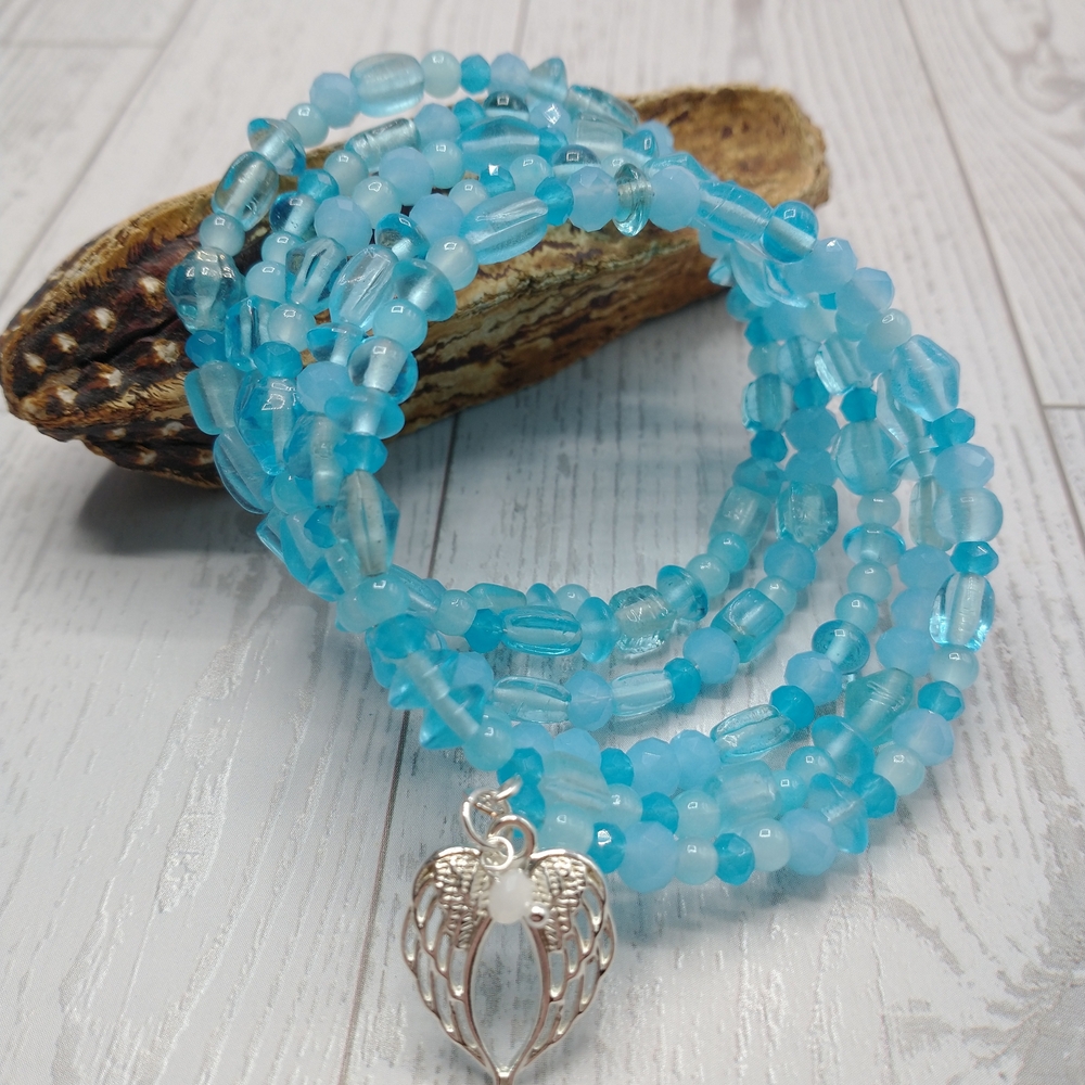 New Turquoise Color Beaded Memory Wire Bracelet With An Angel Charm